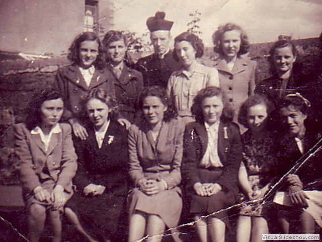 Eva (front row, 3rd from right), Father Hurley (back row)
A procession of the 'Children of Mary'
1946